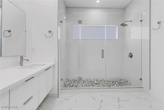 bathroom with vanity and an enclosed shower