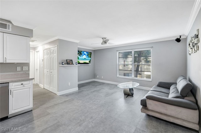 living room featuring ceiling fan and crown molding