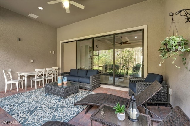 20533 Wilderness Ct, Estero, FL 33928 - living area with ceiling fan and a textured wall