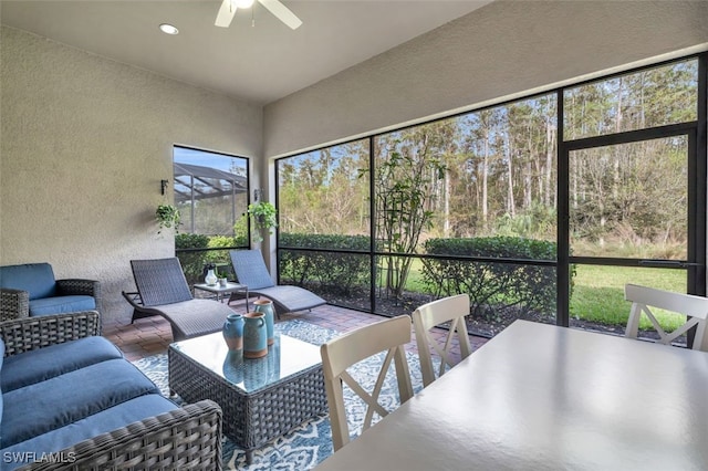 20533 Wilderness Ct, Estero, FL 33928 - sunroom featuring a ceiling fan, an outdoor hangout area, and outdoor dining area