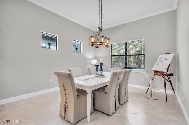 dining area with crown molding, light tile patterned flooring, and a chandelier