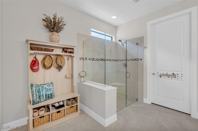 20533 Wilderness Ct, Estero, FL 33928 - full bathroom featuring a stall shower, baseboards, and tile patterned flooring