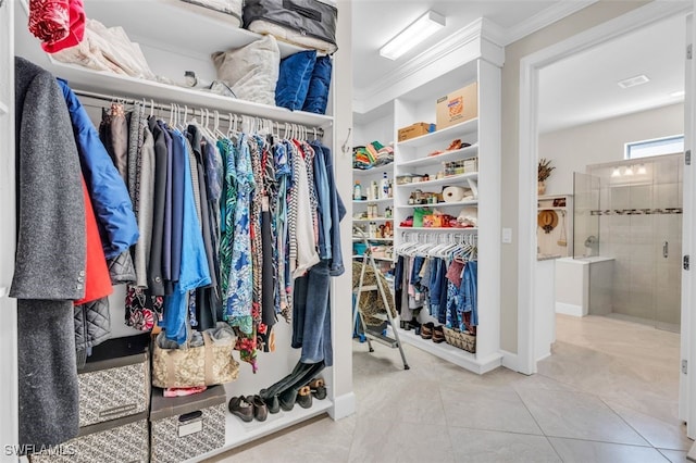 walk in closet featuring light tile patterned floors