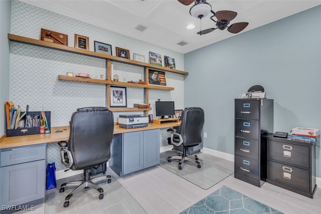 office space with ceiling fan, light tile patterned flooring, and built in desk