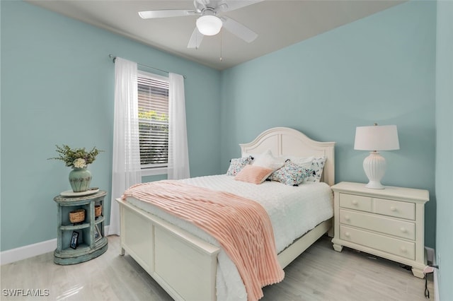 20533 Wilderness Ct, Estero, FL 33928 - bedroom featuring wood finished floors, baseboards, and ceiling fan