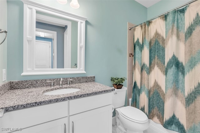 full bathroom with vanity, toilet, and shower / tub combo