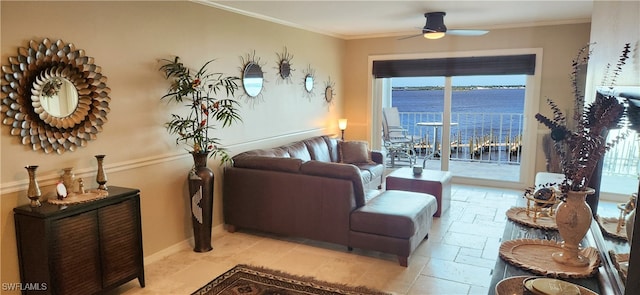 living room featuring a water view, ceiling fan, and crown molding