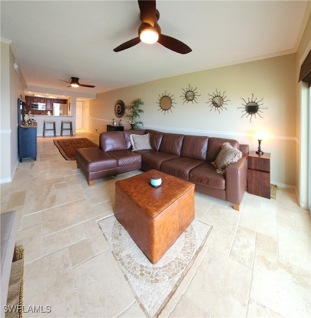 living room with ornamental molding