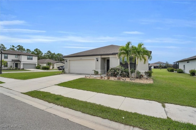10852 Marlberry Way N, Fort Myers, FL 33917 - view of front of house with an attached garage, concrete driveway, a front lawn, stucco siding, and a residential view