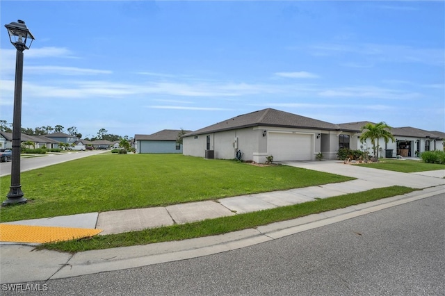 ranch-style home featuring a garage and a front lawn