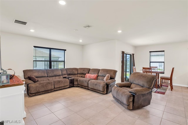 living room featuring light tile patterned flooring