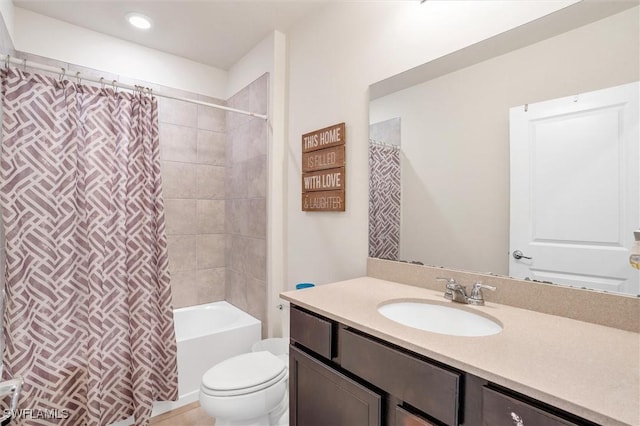 10852 Marlberry Way N, Fort Myers, FL 33917 - bathroom featuring vanity, toilet, shower / bath combo, and recessed lighting