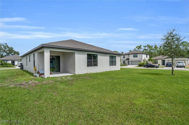 exterior space with a lawn