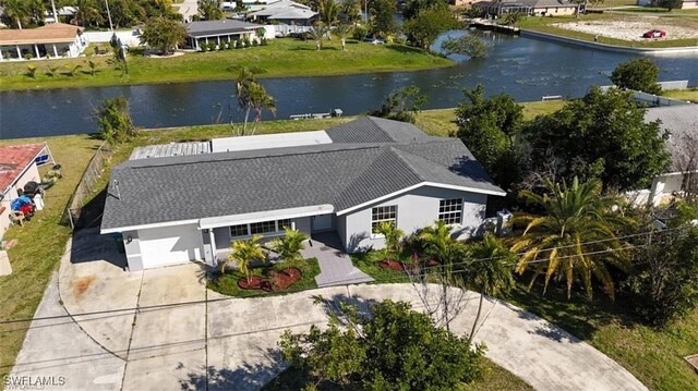 bird's eye view with a water view