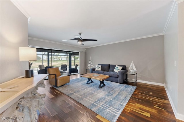 living room with dark hardwood / wood-style floors, ceiling fan, and ornamental molding