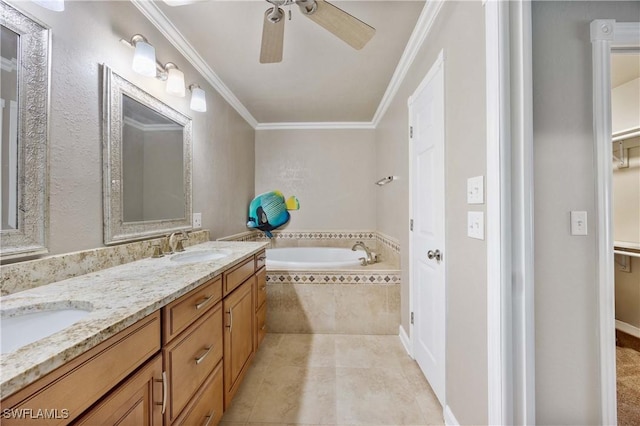 bathroom featuring ceiling fan, tile patterned flooring, tiled bath, vanity, and ornamental molding