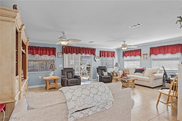 tiled living room with crown molding and ceiling fan