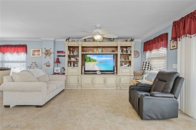 tiled living room featuring crown molding, ceiling fan, and a wealth of natural light