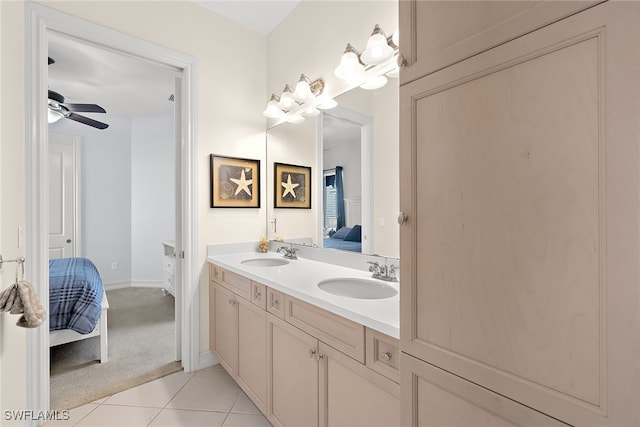 bathroom featuring vanity, tile patterned floors, and ceiling fan