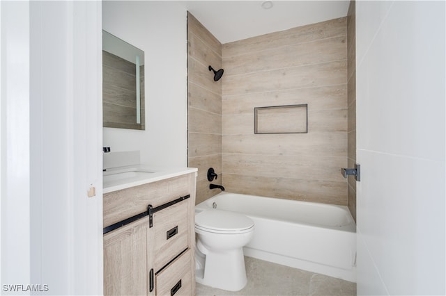 full bathroom with tile patterned floors, vanity, toilet, and tiled shower / bath