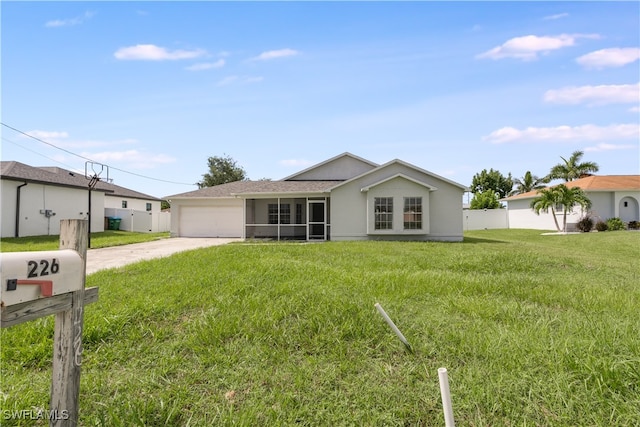 single story home with a garage and a front yard