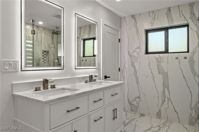 bathroom featuring vanity and a shower