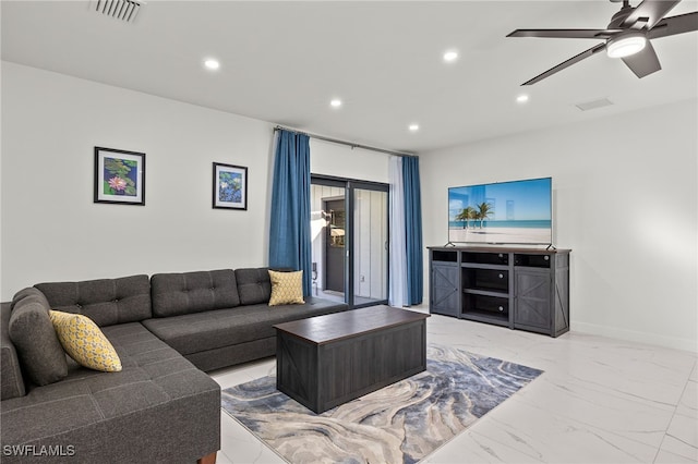 living room featuring ceiling fan