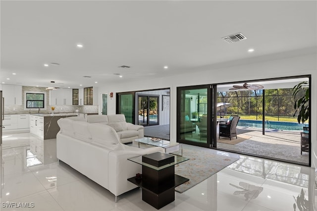 living room featuring ceiling fan