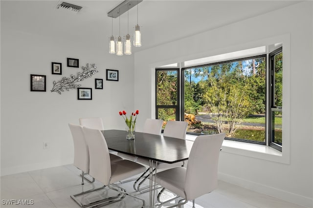 dining space with a wealth of natural light