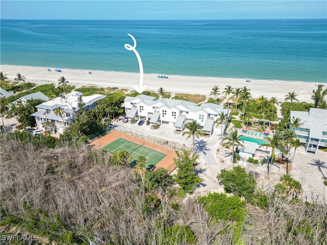 bird's eye view with a view of the beach and a water view