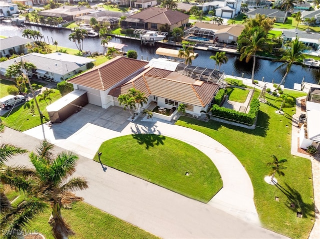 drone / aerial view with a water view