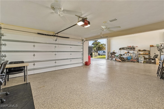 garage with a garage door opener and ceiling fan