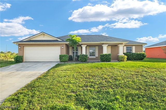 ranch-style house featuring a garage and a front lawn