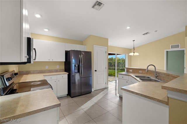 kitchen with white cabinetry, sink, refrigerator with ice dispenser, stove, and pendant lighting