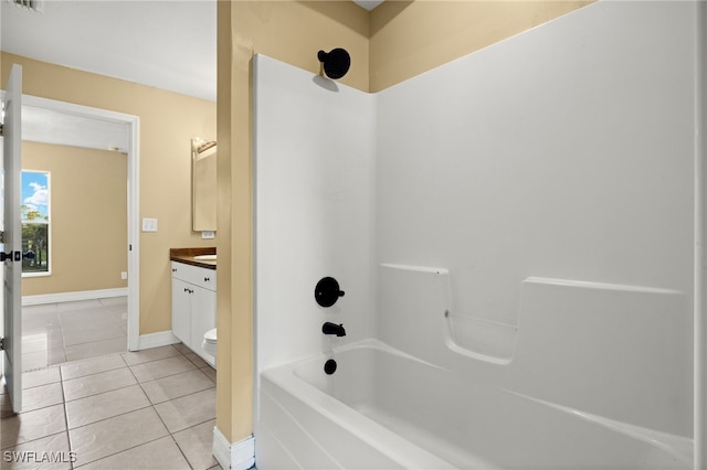 full bathroom featuring tile patterned flooring, vanity, shower / bath combination, and toilet