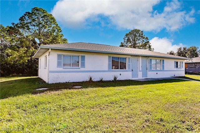 view of front of house with a front yard