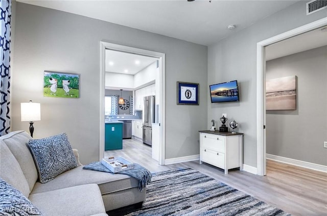 living room featuring light hardwood / wood-style flooring