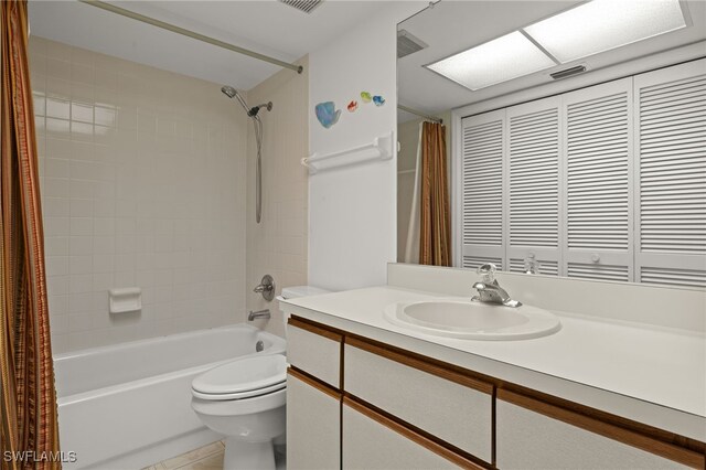 full bath featuring vanity, toilet, visible vents, and shower / bath combo