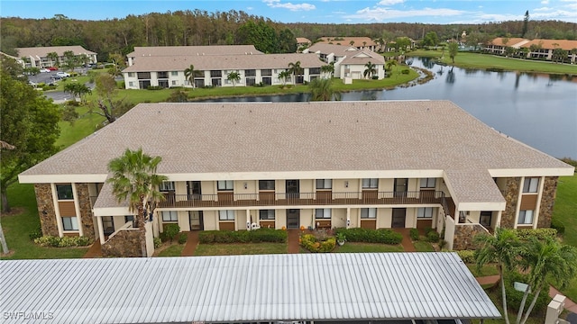 bird's eye view with a water view