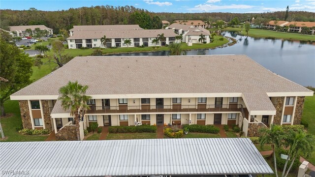 view of front of house featuring a water view