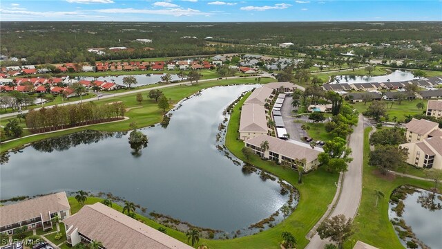 bird's eye view featuring a residential view and a water view