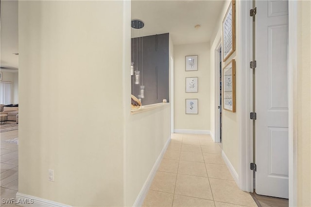 hallway with light tile patterned flooring