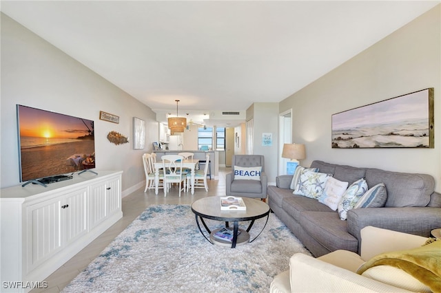 living room with light hardwood / wood-style floors