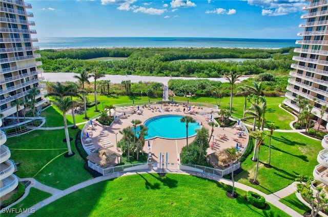 view of pool with a water view