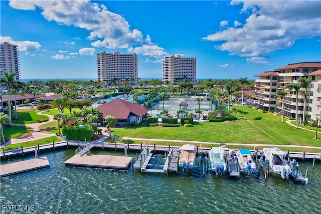 birds eye view of property with a water view