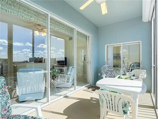 22700 Island Pines Way Unit 503, Fort Myers Beach, FL 33931 - sunroom featuring a ceiling fan