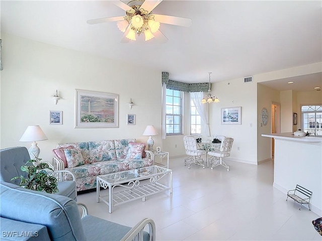 22700 Island Pines Way Unit 503, Fort Myers Beach, FL 33931 - living room featuring a ceiling fan and baseboards
