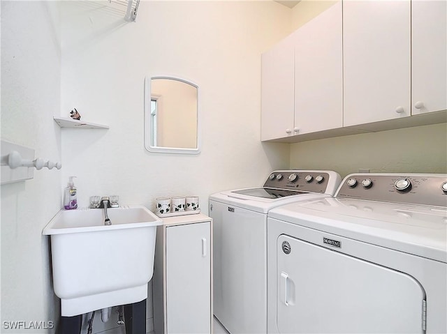 22700 Island Pines Way Unit 503, Fort Myers Beach, FL 33931 - laundry room with separate washer and dryer and cabinet space