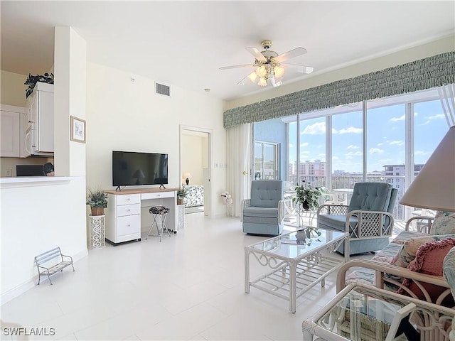 22700 Island Pines Way Unit 503, Fort Myers Beach, FL 33931 - living room featuring ceiling fan