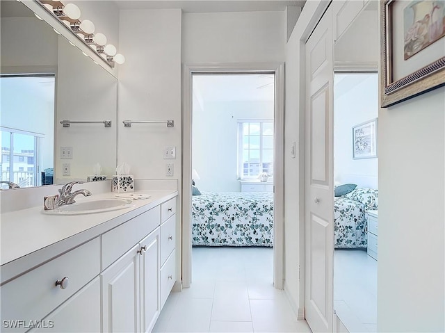 22700 Island Pines Way Unit 503, Fort Myers Beach, FL 33931 - bathroom with ensuite bathroom, vanity, and healthy amount of natural light